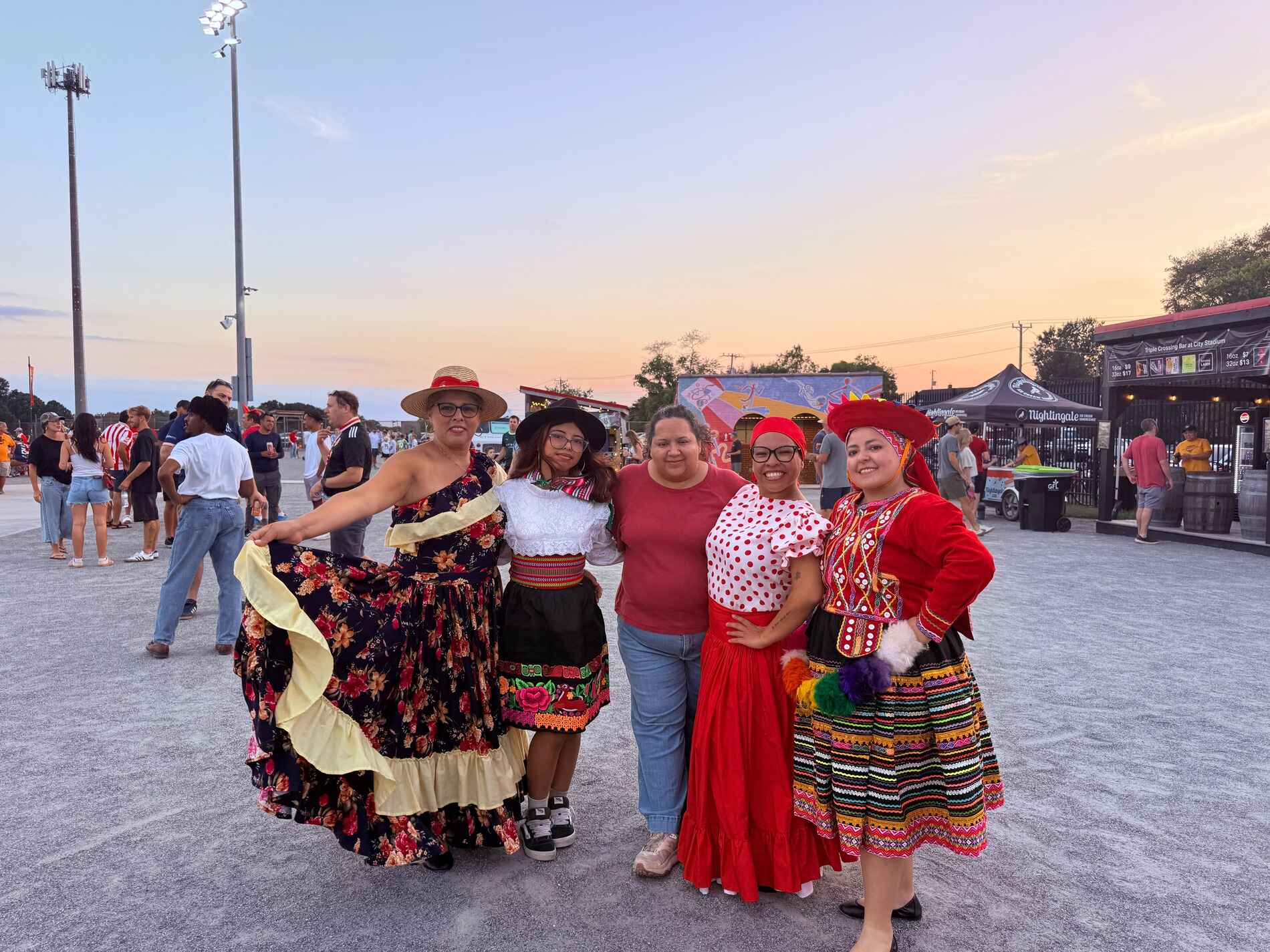 group of female dancers in traditional hispanic dress