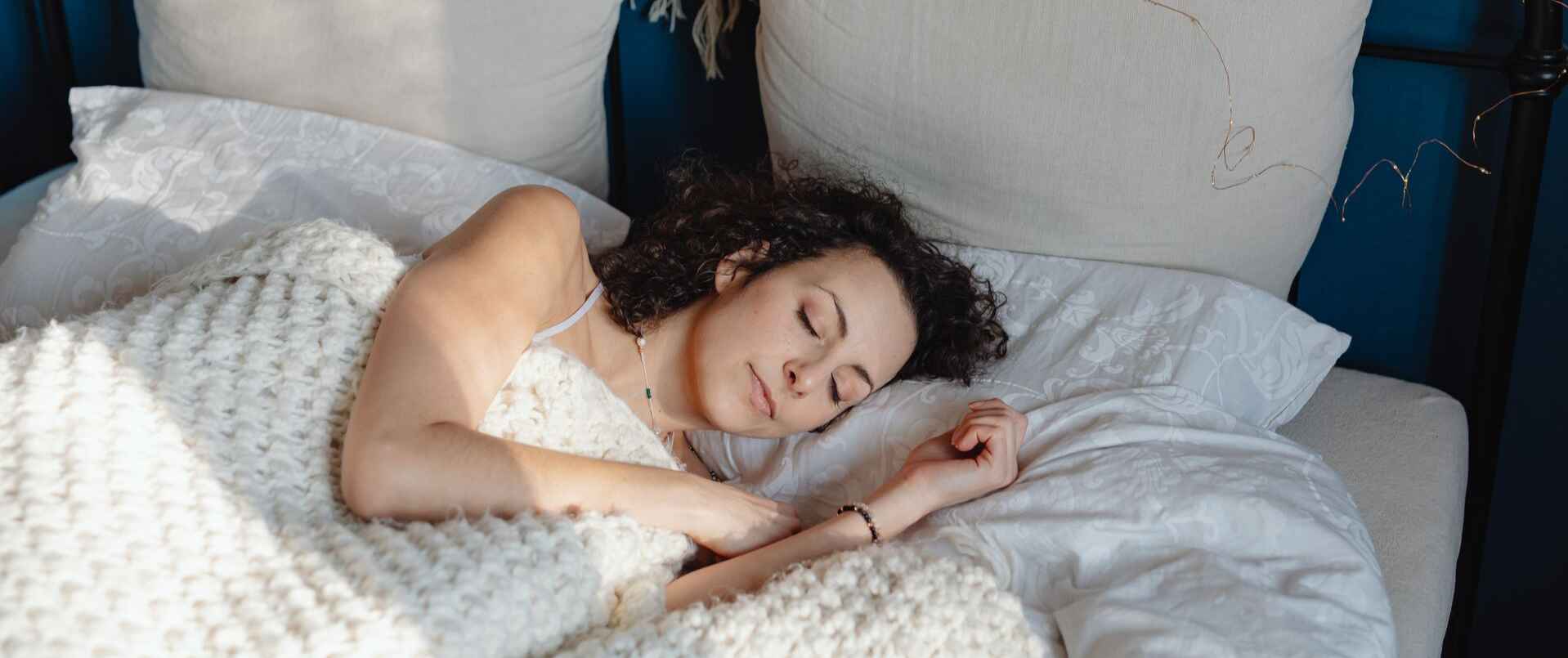 woman sleeping in morning light
